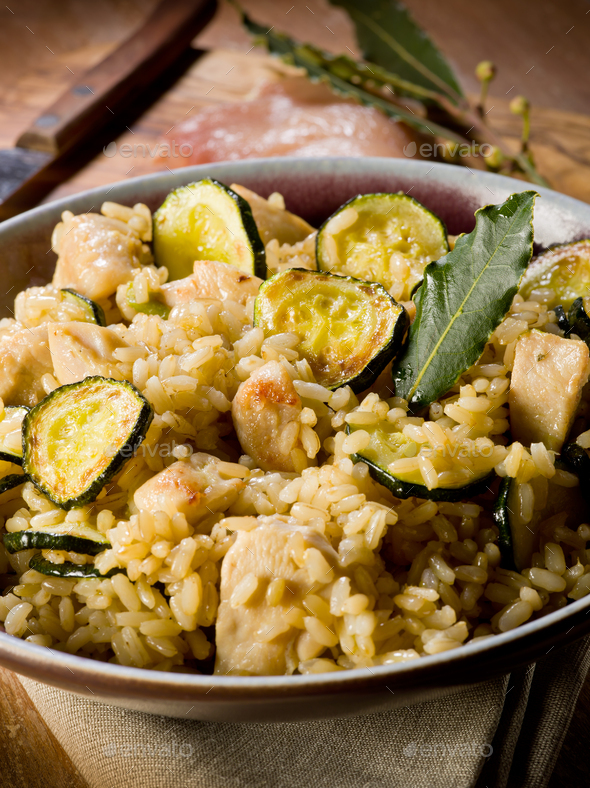 risotto with chicken chest and zucchinis Stock Photo by